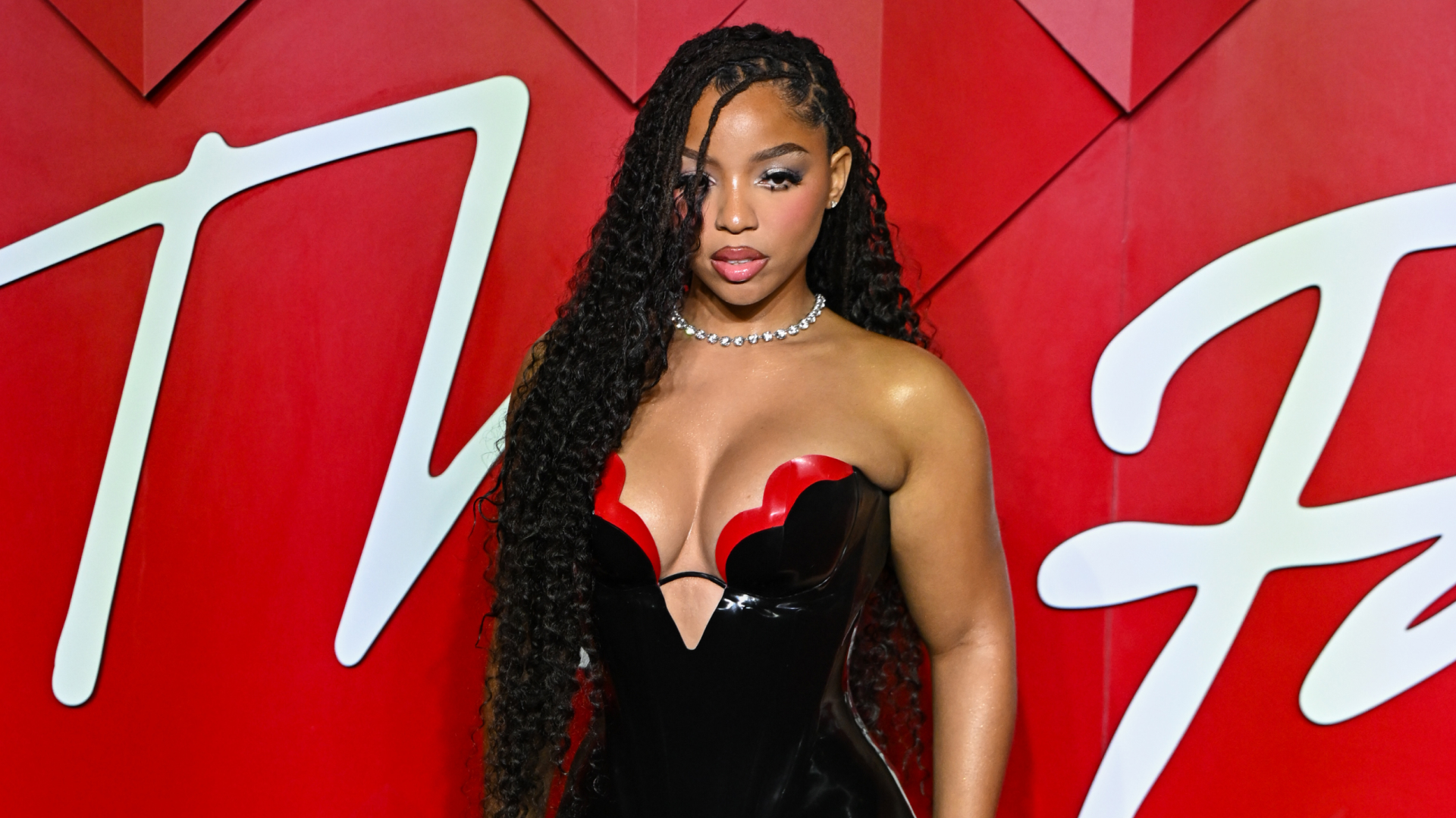 Chloe Bailey posing for the camera on the red carpet. 