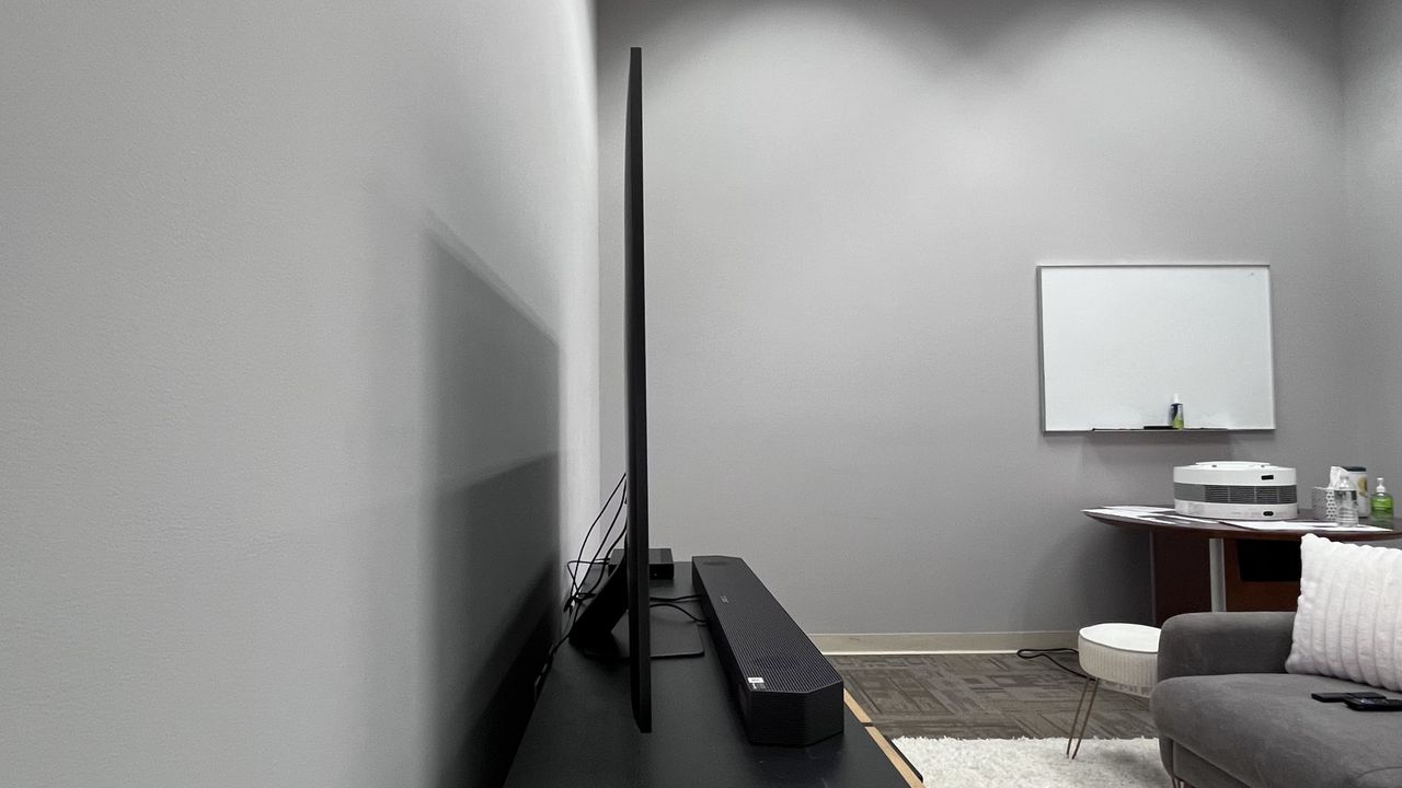 Samsung QN90F shown from the side to illustrate its slim design