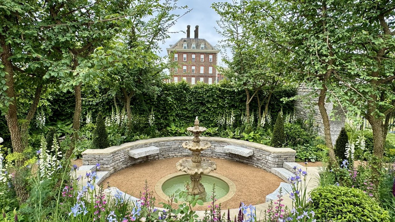 The Bridgerton Garden with central water feature and floral planting borders