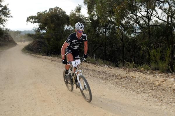Troy Glennan out of the saddle on his way to 18th place.
