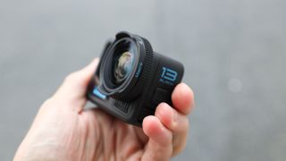 GoPro HERO13 Black action camera held in a hand