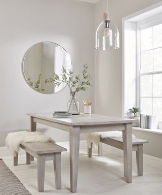 White painted dining table by Cox and Cox