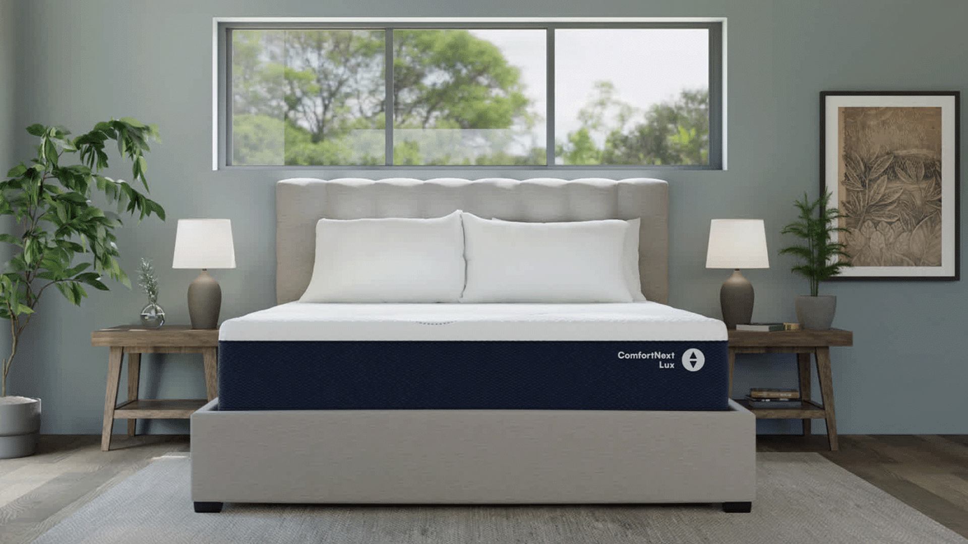 The Sleep Number Comfort Lux mattress on a bed frame in a bedroom