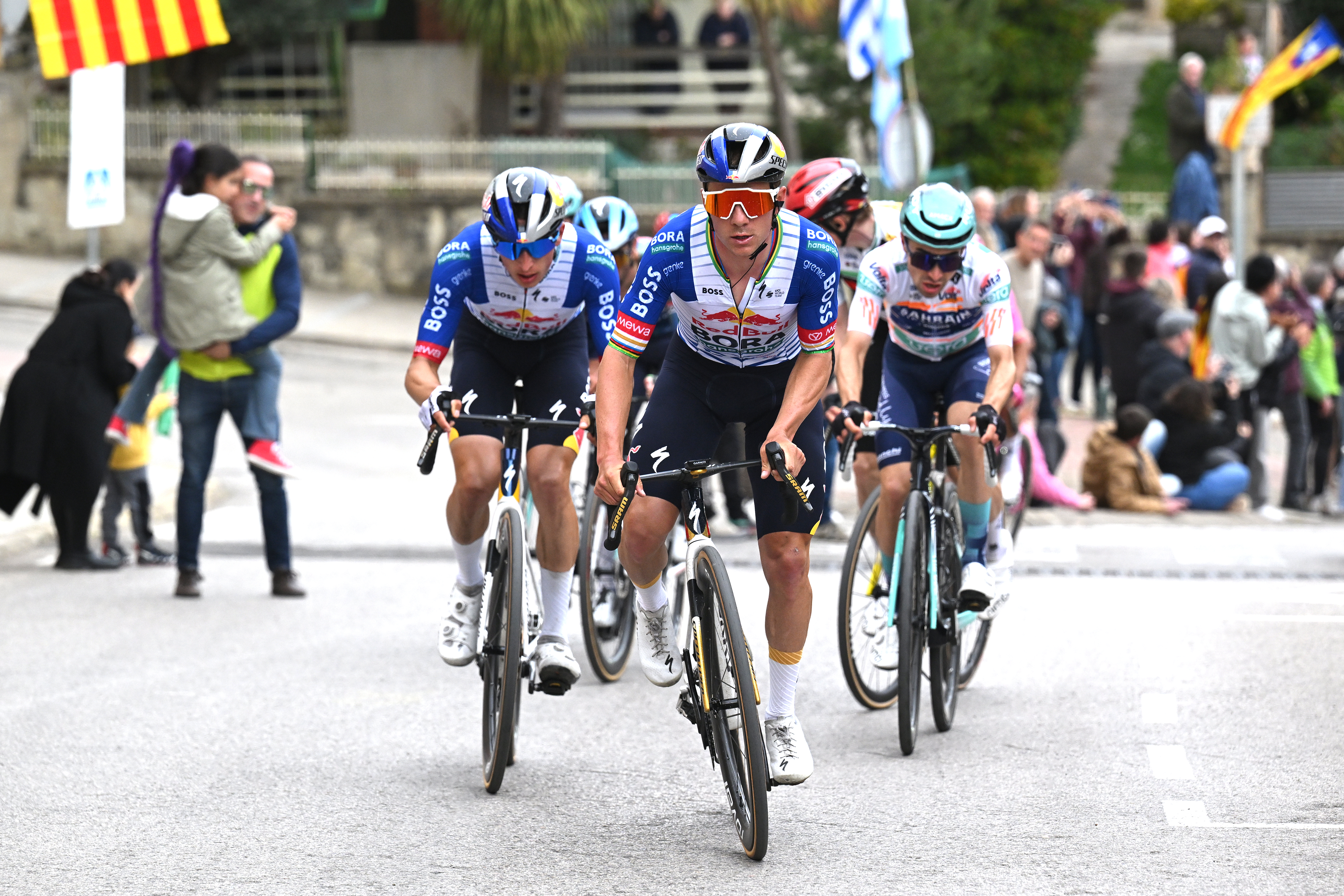 QUERALT, SPAIN - MARCH 28: (L-R) Florian Lipowitz of Germany, Remco Evenepoel of Belgium and Team Red Bull - BORA - hansgrohe and Lenny Martinez of France and Team Bahrain - Victorious - Orange Best Young Rider Jersey compete in the breakaway during the 105th Volta a Catalunya 2026, Stage 6 a 158.2km stage from La Berga to Queralt 1133m / #UCIWT / on March 28, 2026 in Queralt, Spain. (Photo by Szymon Gruchalski/Getty Images)
