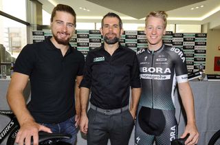 Ralph Denk with two of his new riders Peter Sagan and Pascal Ackermann