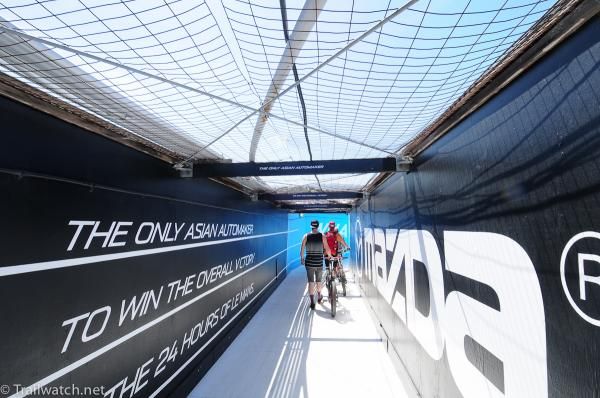 Riders cross one of the many bridges over the racetrack