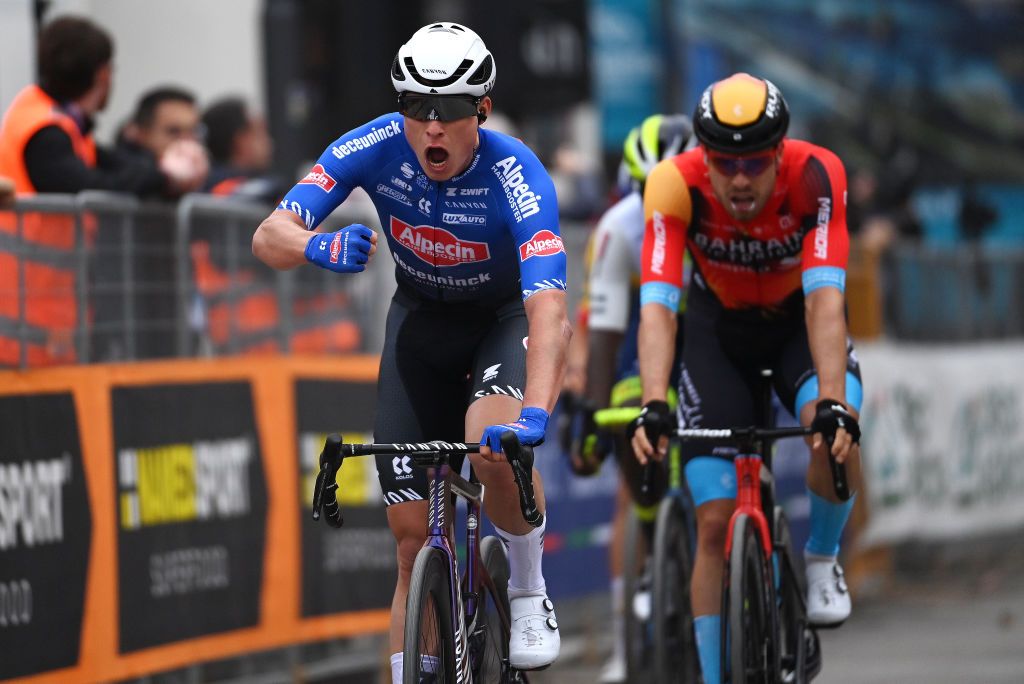 FOLIGNO ITALY MARCH 08 Jasper Philipsen of Belgium and Team AlpecinDeceuninck celebrates at finish line as stage winner ahead of Phil Bauhaus of Germany and Team Bahrain Victorious during the 58th TirrenoAdriatico 2023 Stage 3 a 216km stage from Follonica to Foligno 231m UCIWT TirrenoAdriatico on March 08 2023 in Foligno Italy Photo by Tim de WaeleGetty Images