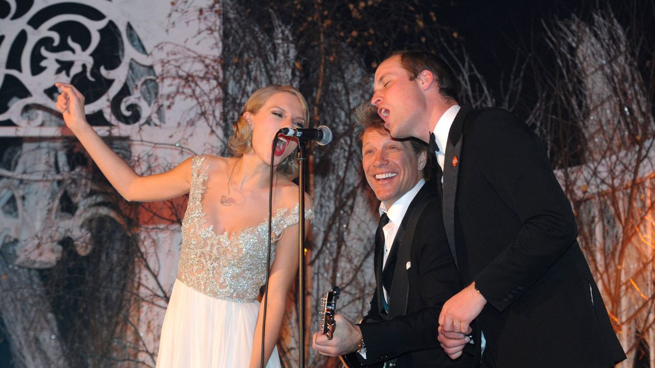 Taylor Swift and Prince William performing on stage with Bon Jovi