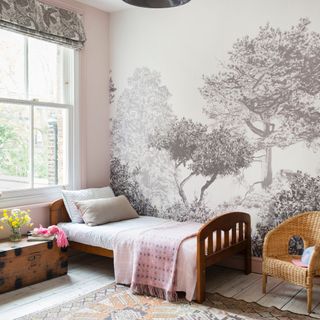 children's room with grey and white trees mural and twin bed