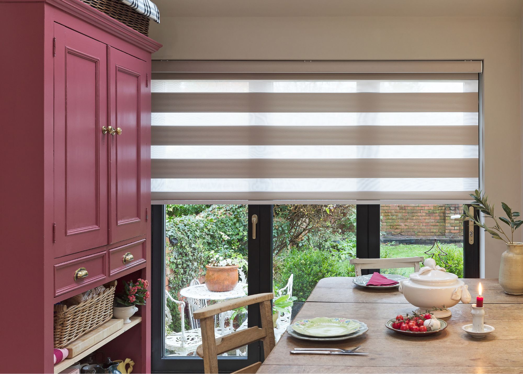 kitchen with burgundy dresser, glass doors with day and night blinds