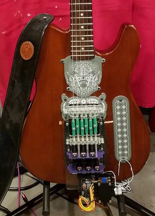 Olav Kern's guitar string-picking robot