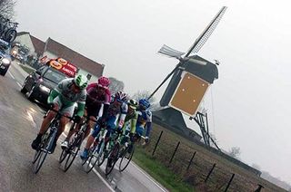 The typical windmill and the breakaway riders Moreau, Thijs, Albasini and Schmitz