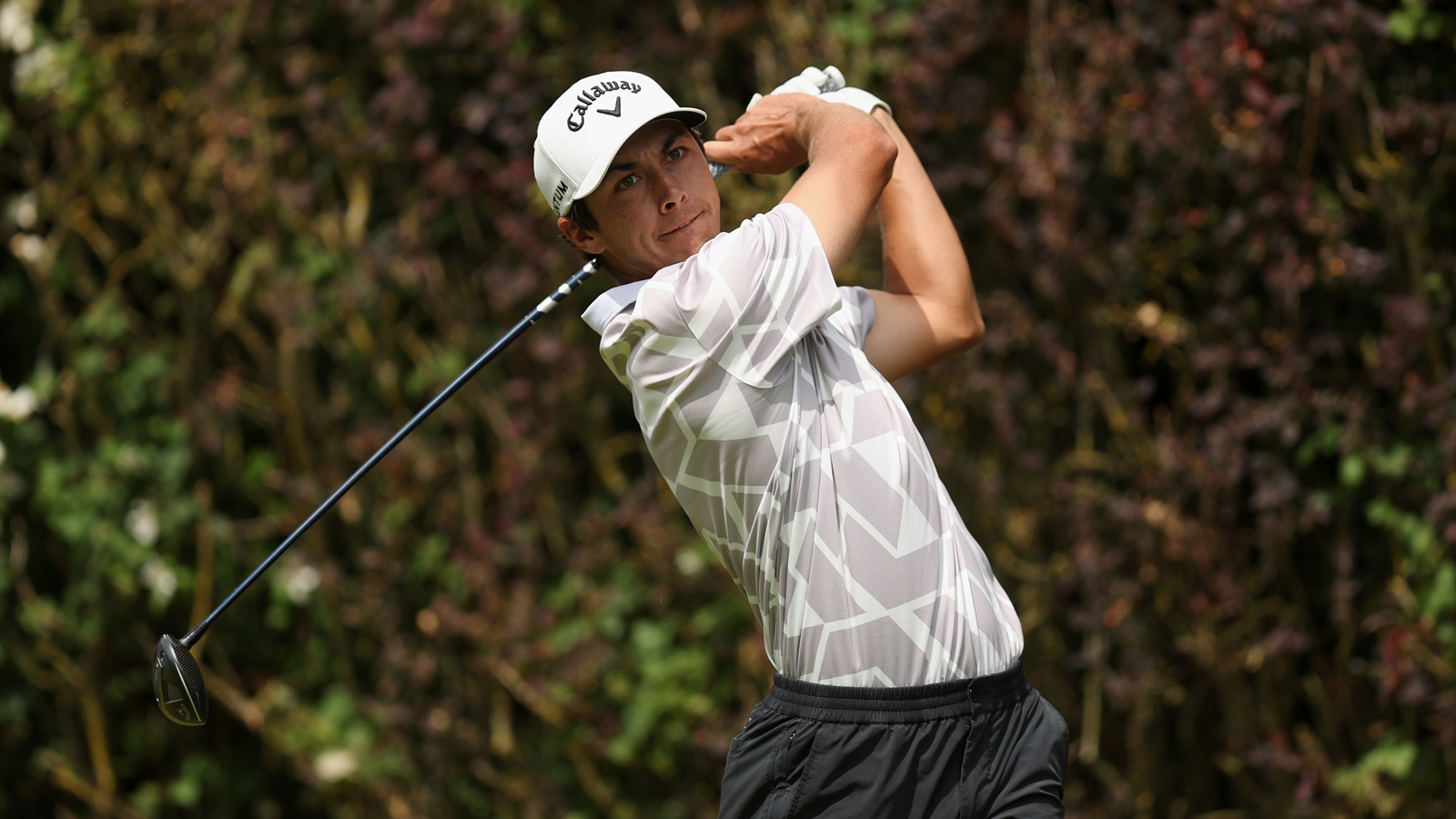 Matthis Besard hits a driver off the tee