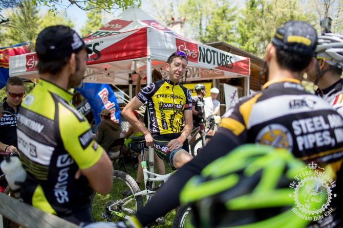 Jeremiah Bishop talks with other racers after finishing the Trans-Sylvania Epic