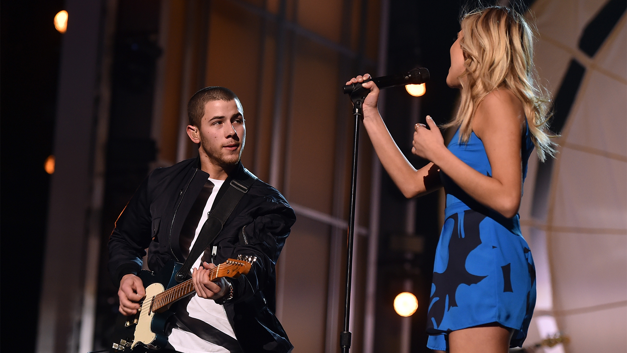 Nick Jonas and singer Kelsea Ballerini rehearse onstage during the 51st Academy of Country Music Awards at MGM Grand Garden Arena on April 1, 2016 in Las Vegas