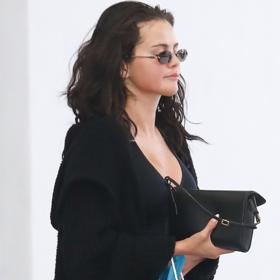 Selena Gomez wore all-black loungewear with a backless pair of Mary Janes