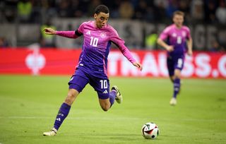 Jamal Musiala of Germany runs with a ball during the international friendly match between Germany and Netherlands at Deutsche Bank Park on March 26, 2024 in Frankfurt am Main, Germany. (Photo by Stefan Matzke - sampics/Corbis via Getty Images)