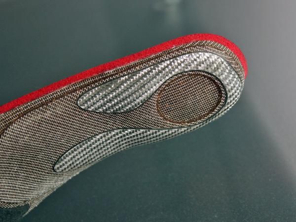 A fiber composite piece adds further heel stabilization.