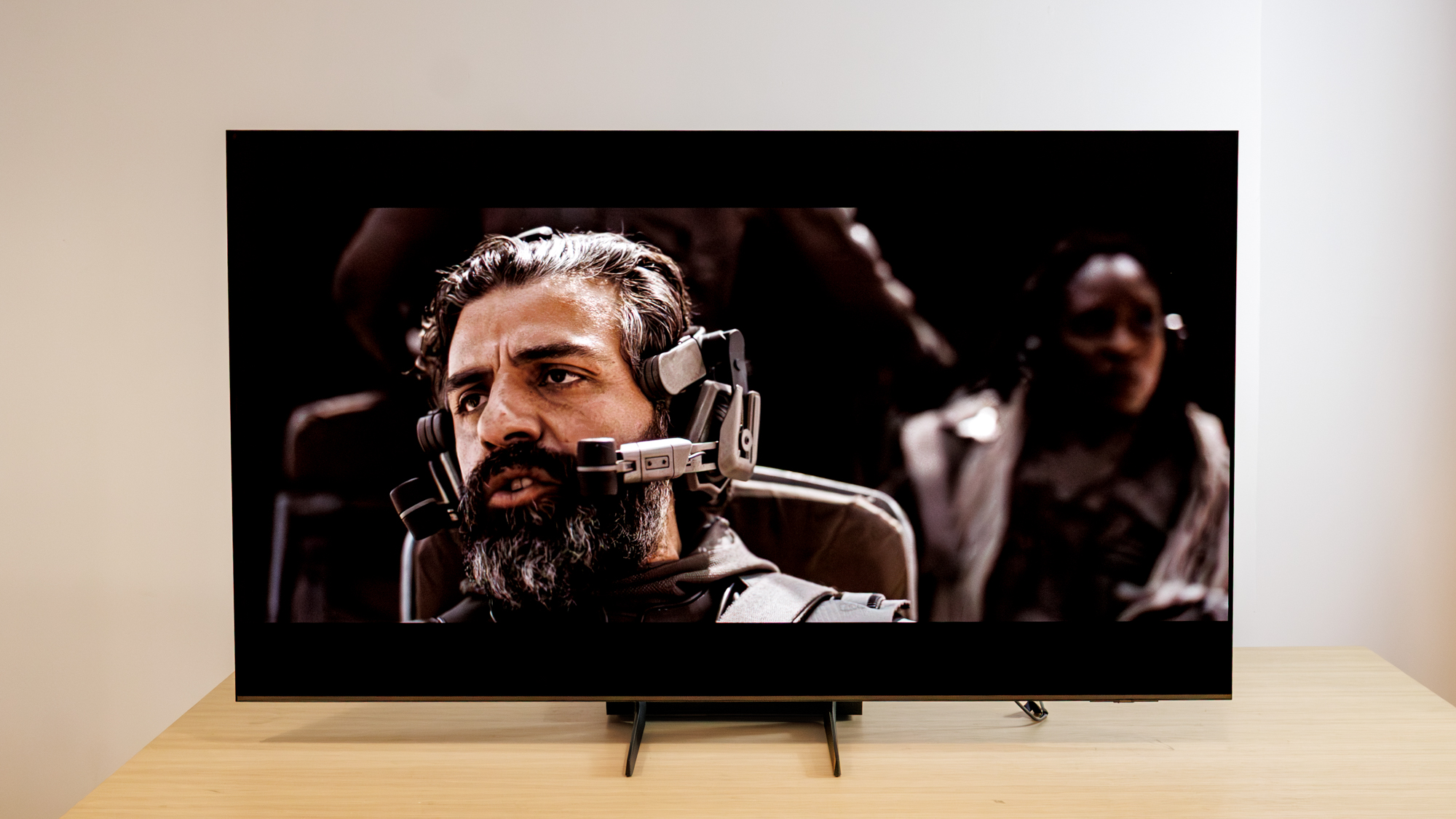 Samsung OLED S85F TV on a table