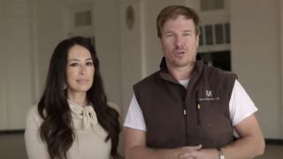 Chip and Joanna Gaines speaking to the camera during renovations for Fixer Upper: The Hotel