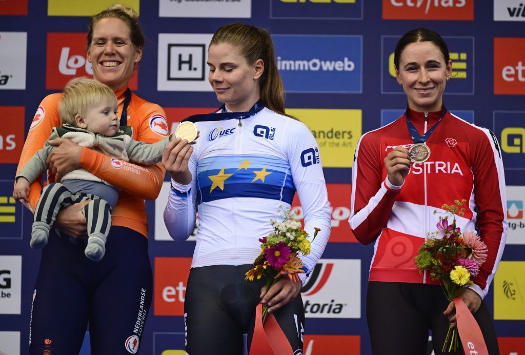 Dutch Ellen Van Dijk , winner of the silver medal, Belgian Lotte Kopecky winner of the gold medal and Austrian Christina Schweinberger , winner of the bronze medal pictured on the podium of the time trial Elite Women at the European Championship 2024, in Hasselt, Wednesday 11 September 2024. The UEC Road European Championships 2024 will take place from 11 to 15 september in Limburg, Belgium. BELGA PHOTO DIRK WAEM (Photo by DIRK WAEM / BELGA MAG / Belga via AFP)