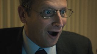 Ron with giant smile on face in The Chair Company Episode 6