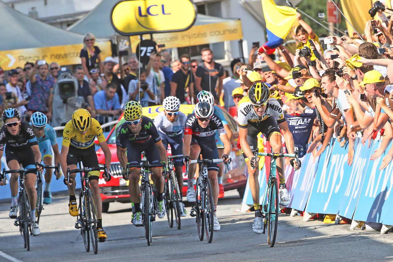 Chris Froome and the podium contenders roll home.