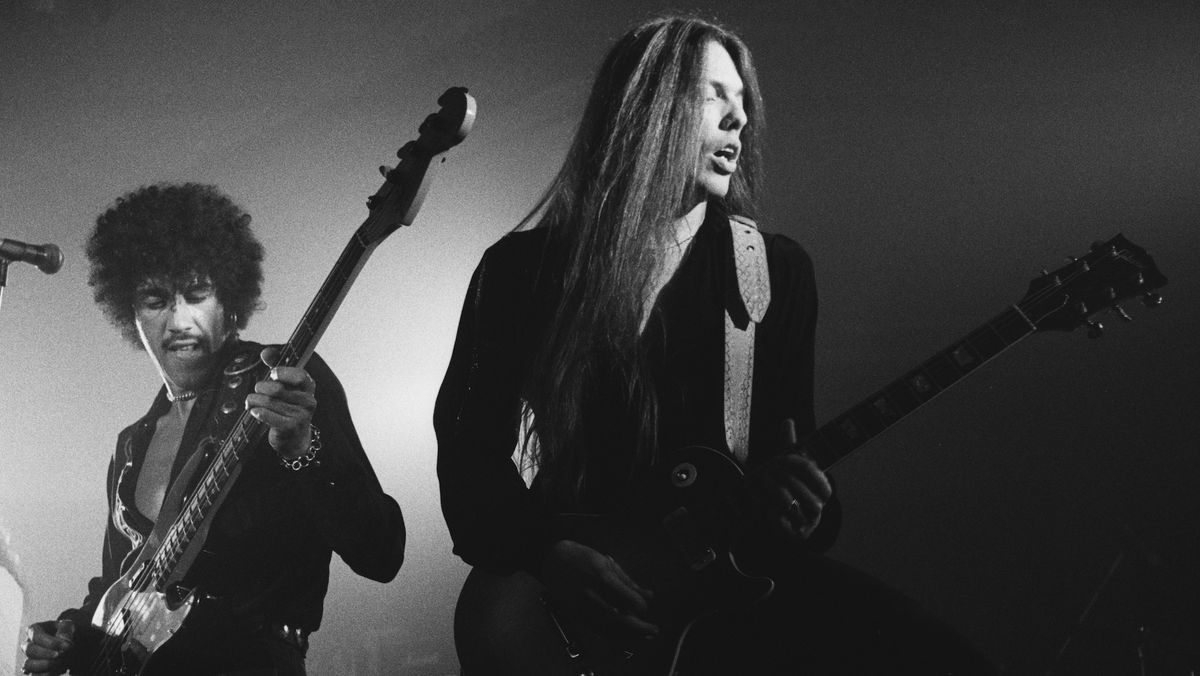 Phil Lynott (left) and Scott Gorham perform at Colston Hall in Bristol, England on October 22, 1976