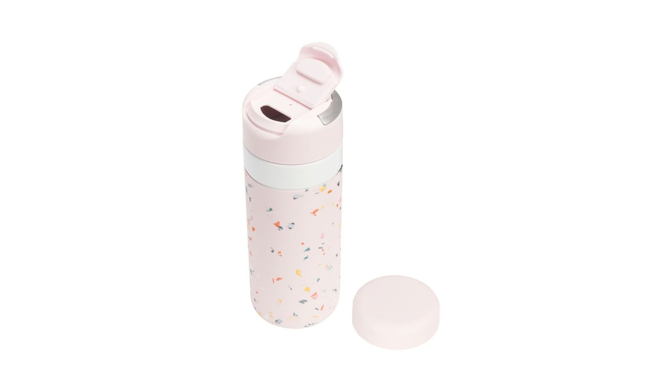A light pink W&amp;P Porter Drink Through Insulated Bottle, for the best coffee travel mugs.
