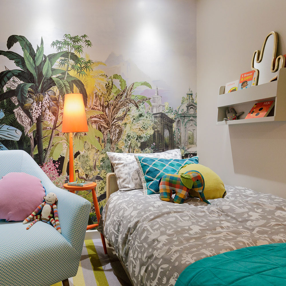 bedroom with bed and wall painting