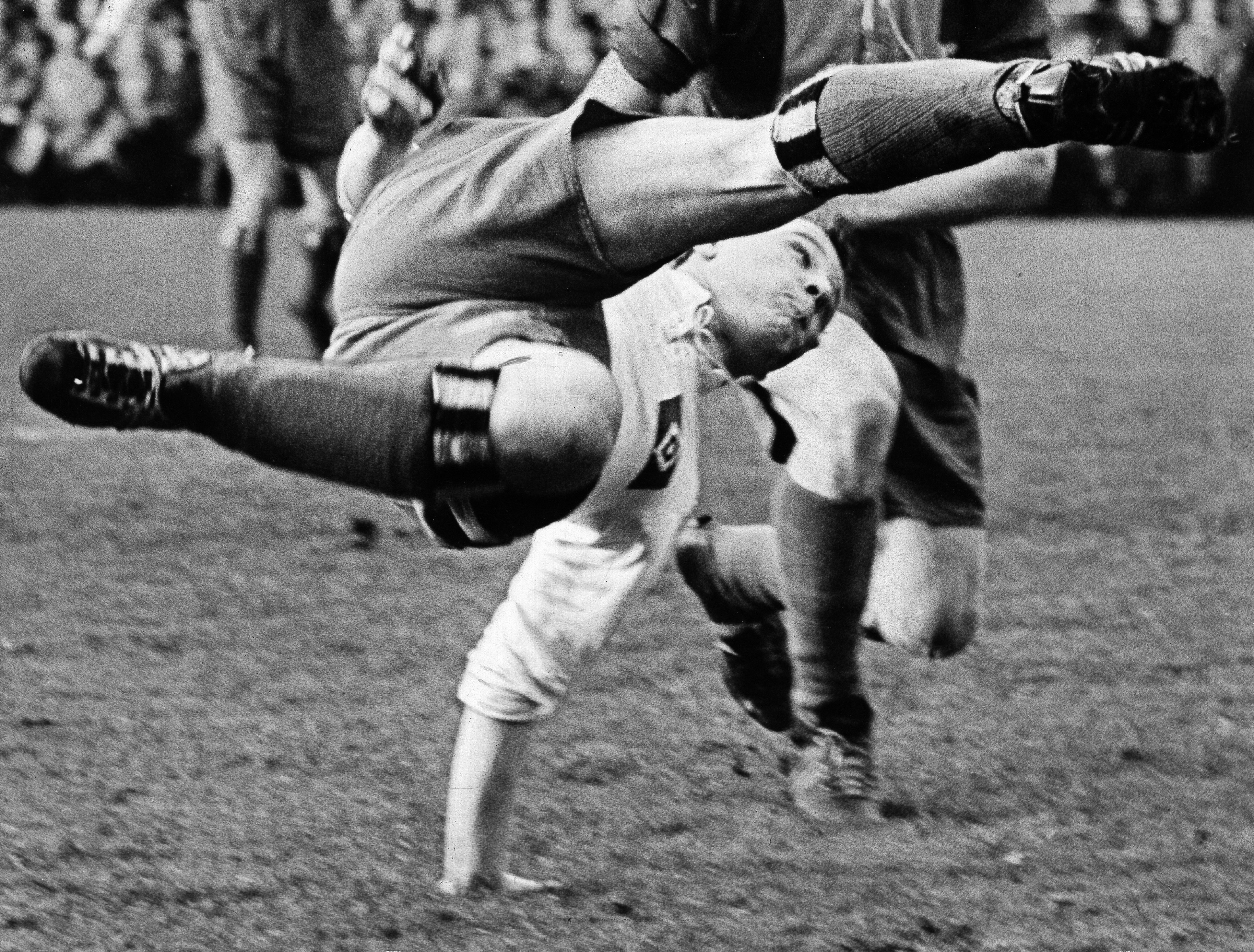 Hamburg's Uwe Seeler attempts an acrobatic effort in November 1954.