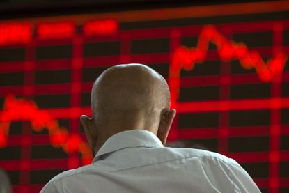 A Chinese investor watches the market.