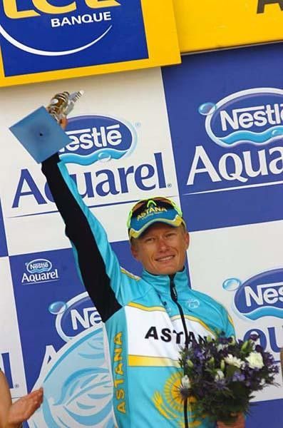 Vino celebrates his time trial win.