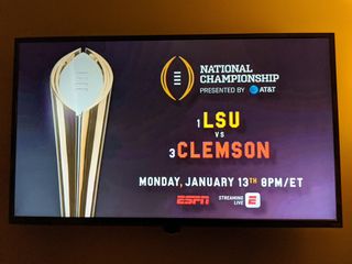 National Championship of college football LSU vs Clemson with Trophy on TV