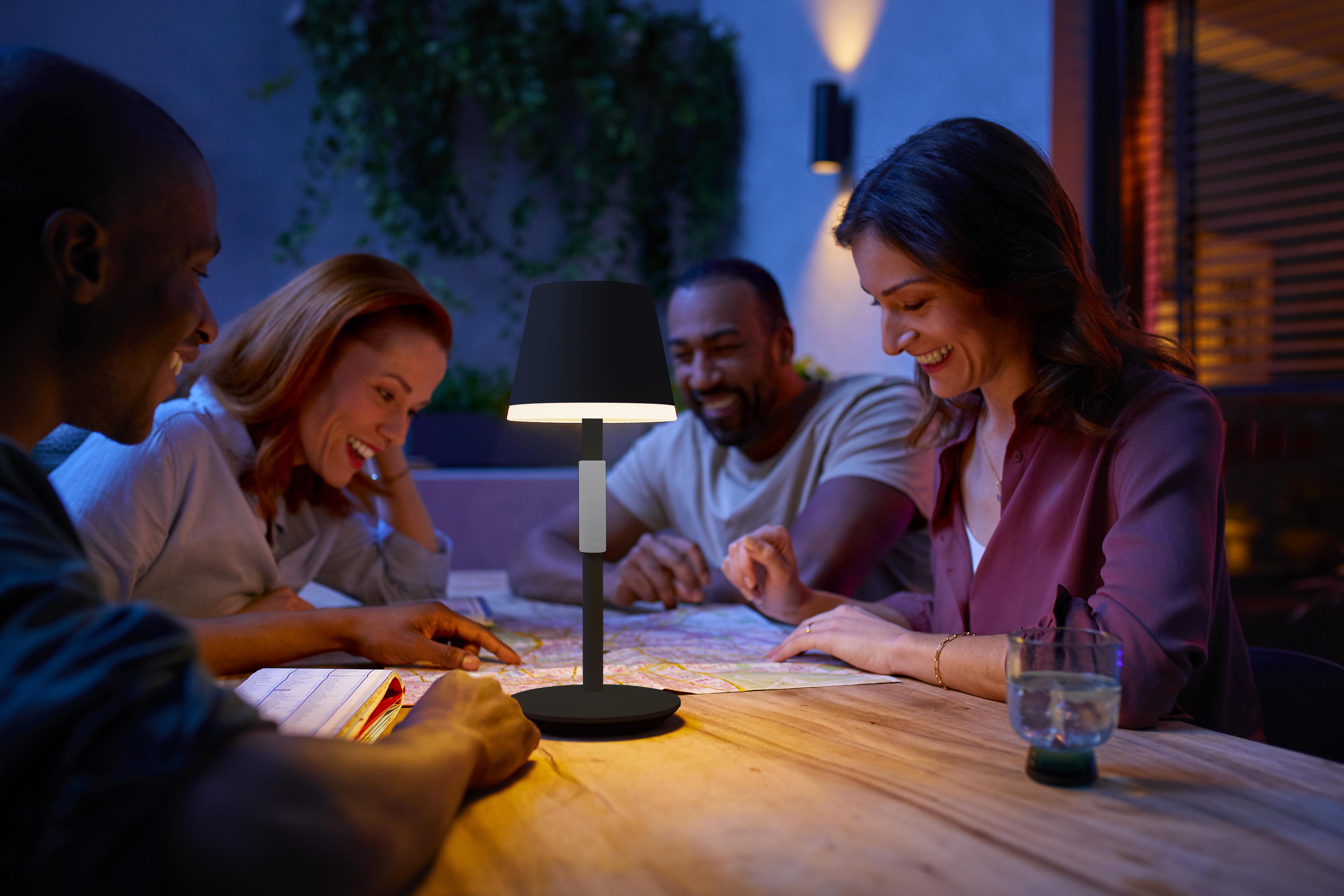 a lifestyle photo of the Philips Hue Go portable table lamp