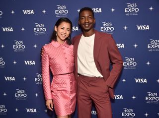 Mamoudou Athie and Leah Lewis at a D23 event