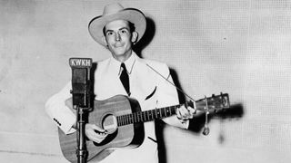 Hank Williams playing the guitar c. 1947
