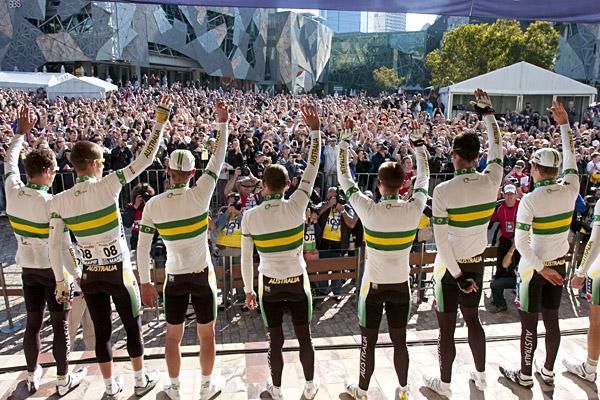 The Australian team at the sign on in Melbourne's Federation Square before a huge crowd.