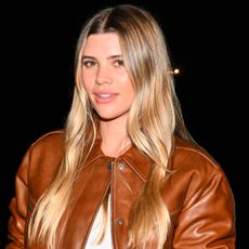 Sofia Richie Grainge poses in France with the Miu Miu crochet tote bag.