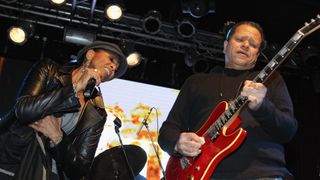 Nona Hendryx (left) and Guitarist Eddie Martinez join guitarist Ronny Drayton onstage during the Million Man Mosh II at New York City's Highline Ballroom, January 21, 2013.