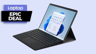 Surface Pro 8 with keyboard against blue background