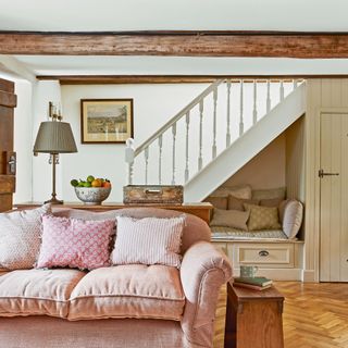 cosy cottage living room with snug under the stairs