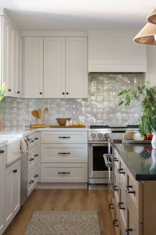 White kitchen with square glazed decorative tile splashback