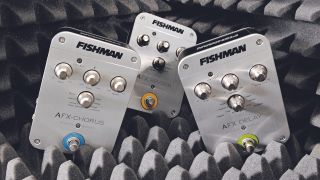 Three Fishman acoustic guitar effects pedals sitting on some acoustic foam