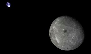 The far side of the moon and distant Earth imaged by the Chang'e-5 T1 mission service module in 2014.