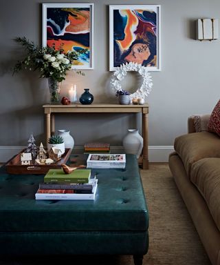 Living room with grey walls, large wooden coffee table beside sofa