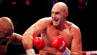  Tyson Fury, wearing red boxing gloves, lashes out at an opponent ahead of the Fury vs Ngannou live stream