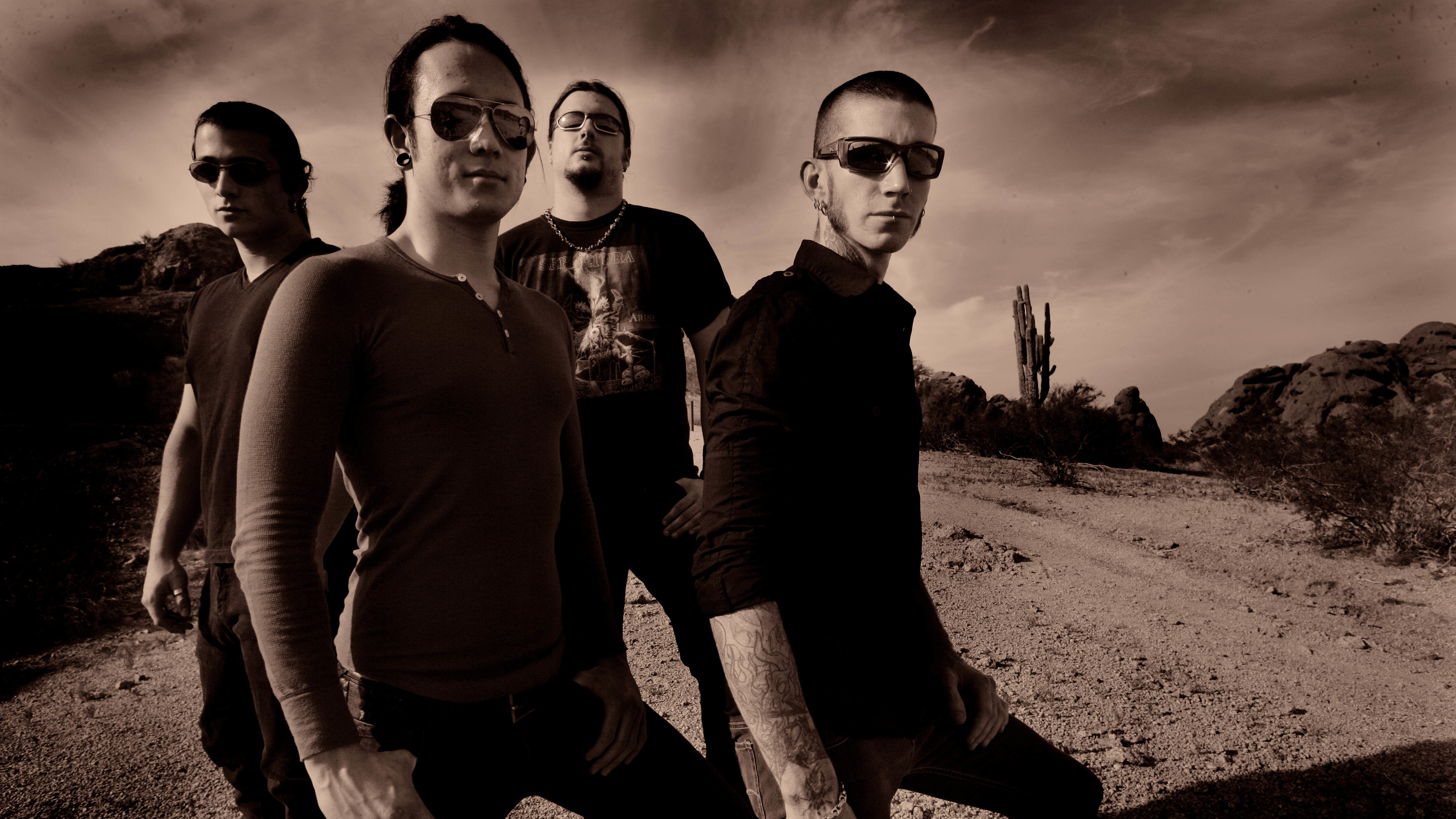 Trivium posed in the desert in 2006