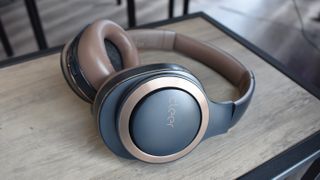 Cheap wireless headphones: Cleer Enduro ANC placed on a desk