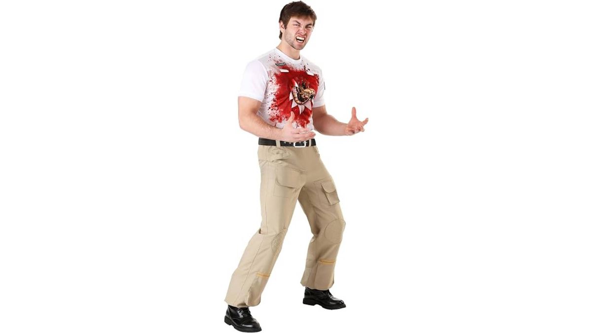 A man dressed in an Aliens chestburster crew outfit, with a latex alien coming out of his chest.